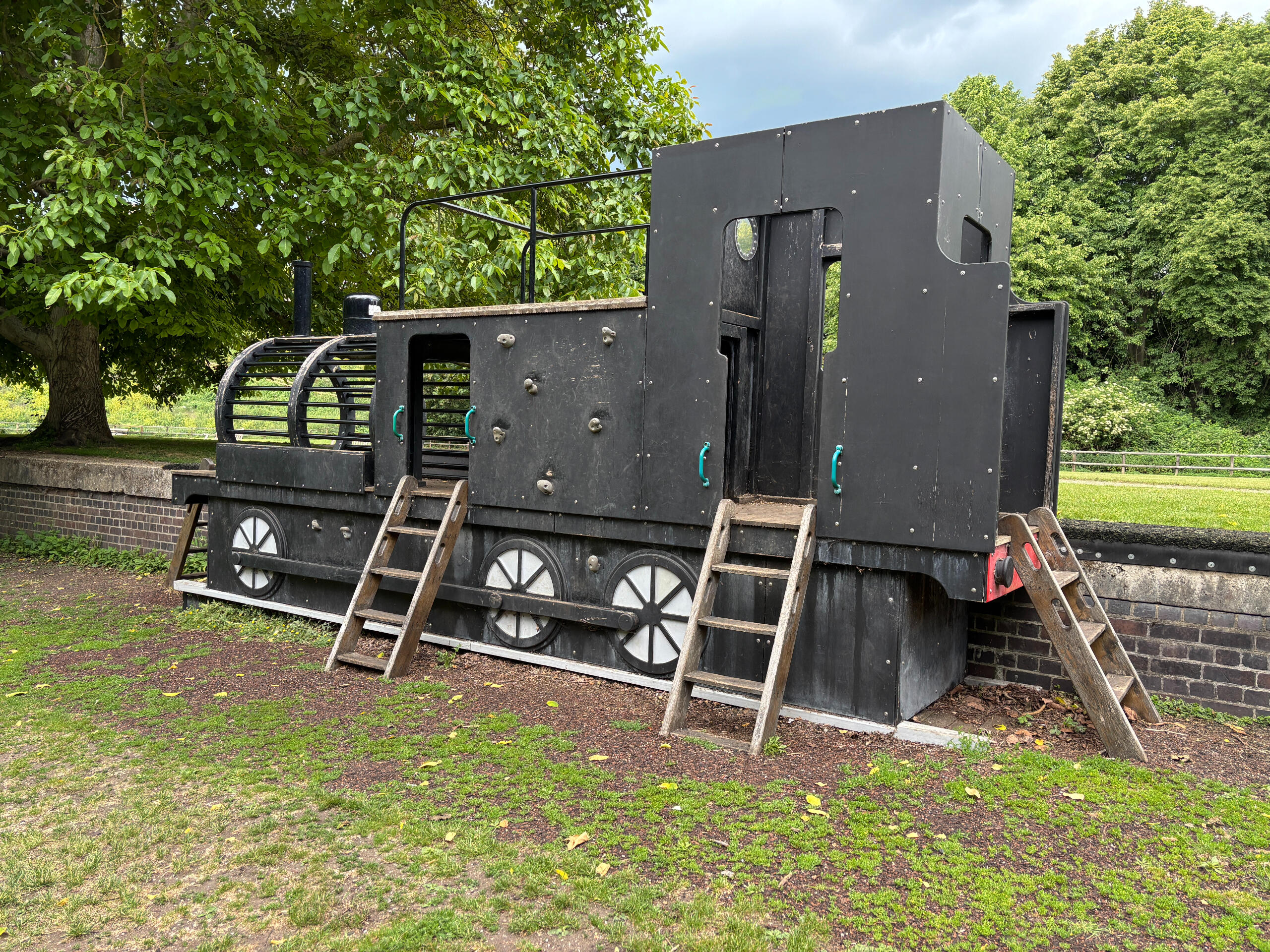 A replica train for children to play on and climb at a country park.